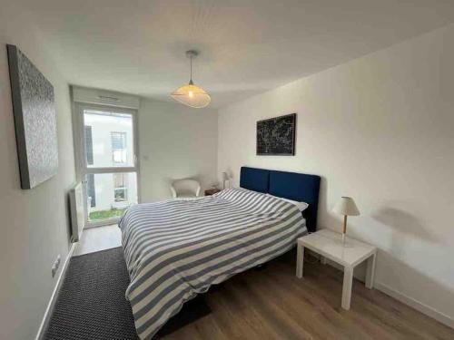 Postel nebo postele na pokoji v ubytování Kerijsel T3 Arzon Port du Crouesty et Port-Navalo