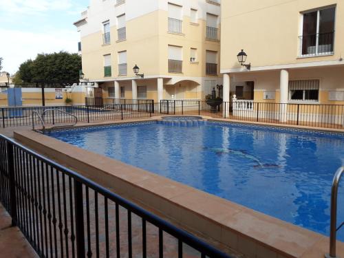 a large swimming pool in front of a building at BRISAS DEL MAR II in Formentera del Segura