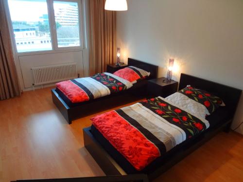 Säng eller sängar i ett rum på Apartment Köln Deutz
