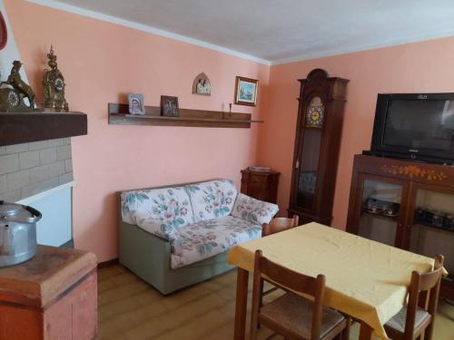 TV a/nebo společenská místnost v ubytování La Casa di Agnese