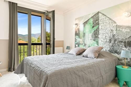 A bed or beds in a room at Casa Nova Maison d'hôtes