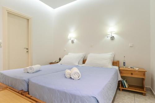 Katil atau katil-katil dalam bilik di Hotel Zeus