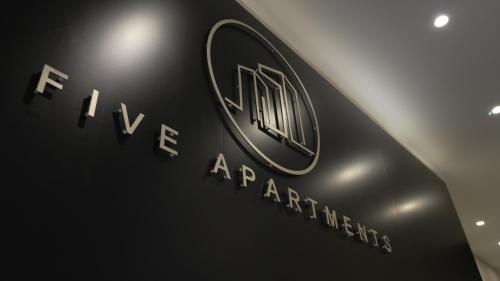 a close up of a car dealership sign at Five Apartments in Blackpool