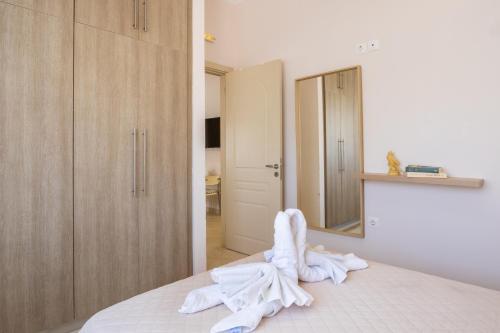 Postel nebo postele na pokoji v ubytování Mystique Apartment