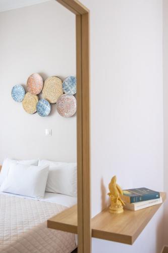 Ένα ή περισσότερα κρεβάτια σε δωμάτιο στο Mystique Apartment