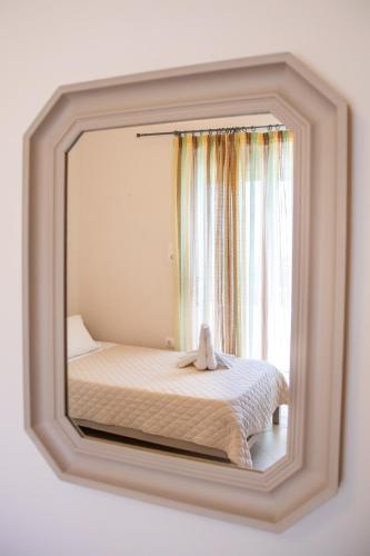 Ένα ή περισσότερα κρεβάτια σε δωμάτιο στο Mystique Apartment