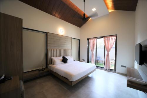 Ένα ή περισσότερα κρεβάτια σε δωμάτιο στο Privystays Jk's Private Villa