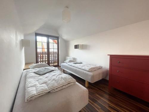 Ένα ή περισσότερα κρεβάτια σε δωμάτιο στο Widok 22
