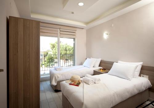 Llit o llits en una habitació de İNDAĞ APART AİLE Oteli