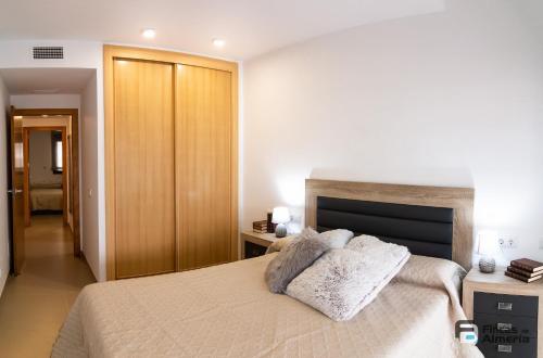 Llit o llits en una habitació de Apartamento Residencial Mirador Playa Serena