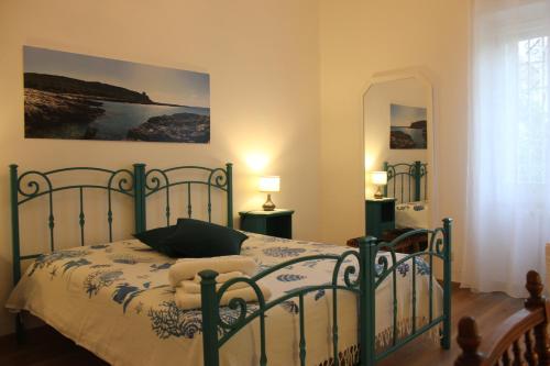 Postel nebo postele na pokoji v ubytování Casina Elio