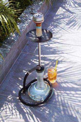a drink stand on the side of a street at Kapetanios Bay Hotel Protaras in Protaras
