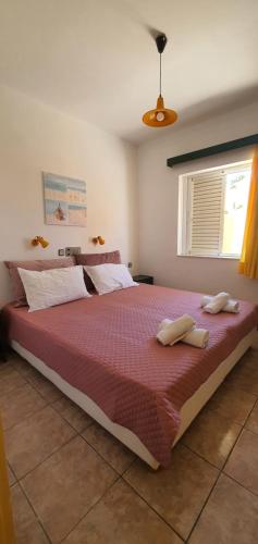 Ένα ή περισσότερα κρεβάτια σε δωμάτιο στο Stella Apartments