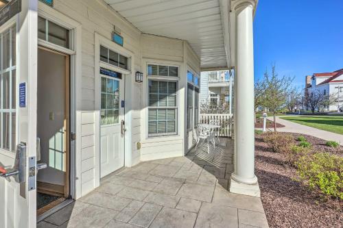 a house with white doors and a porch at Beautiful Day Getaway - Lake Michigan Views in Sheboygan