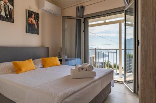 Letto o letti in una camera di Villa Athina