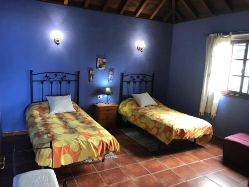 Posteľ alebo postele v izbe v ubytovaní Casa Paredón