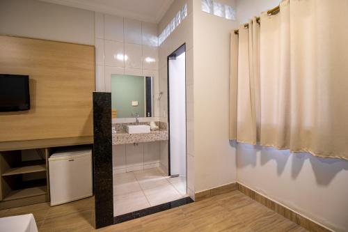 Koupelna v ubytování Porto Mar Hotel