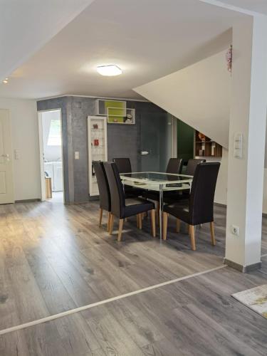 a dining room with a table and chairs at Ferienwohnung Eckberger Weinstrasse 139 in Gamlitz