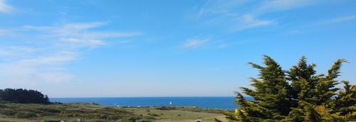 Charmant logement Guidel Plage, vue mer, piscine chauffée, avec une chambre