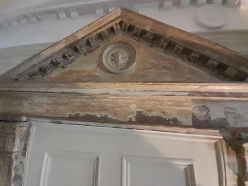 a ceiling over the door of a house at Stone Court House in Maidstone