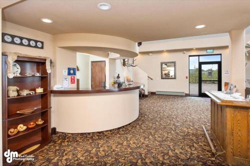 a large room with a large counter and a large window at Kenai Airport Hotel in Kenai