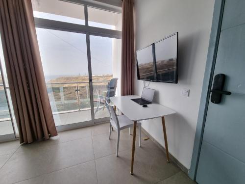 TV/trung tâm giải trí tại Appartement Cara do Mar