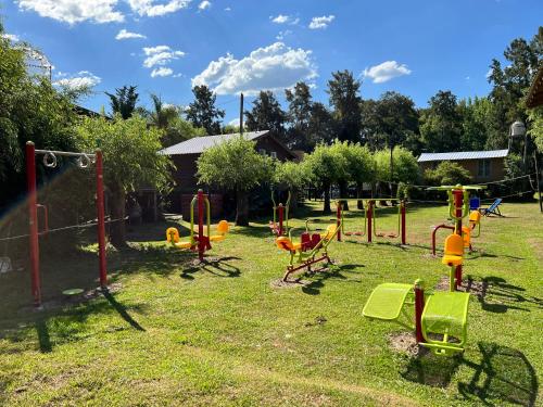 a bunch of playground equipment in a yard at Rio Manso Tigre in Tigre