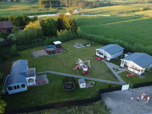 an aerial view of a camping site with a tent at Domek KAMA in Giżycko