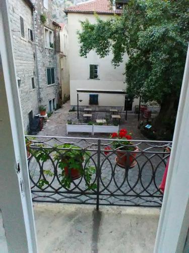 a view of a courtyard from a balcony at Guesthouse Nikoleta in Kotor
