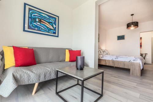 a living room with a couch and a table at Bol Summer Residence in Bol