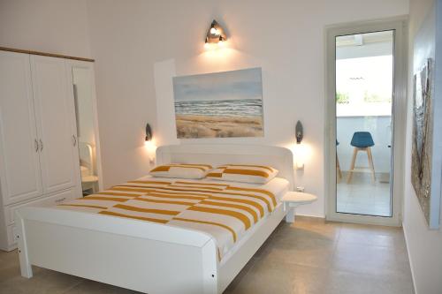 Postel nebo postele na pokoji v ubytování Holiday Home M&M