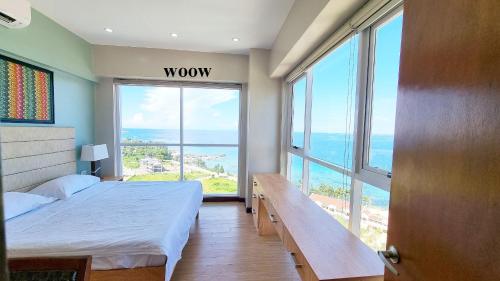 Postel nebo postele na pokoji v ubytování La Mirada Residences