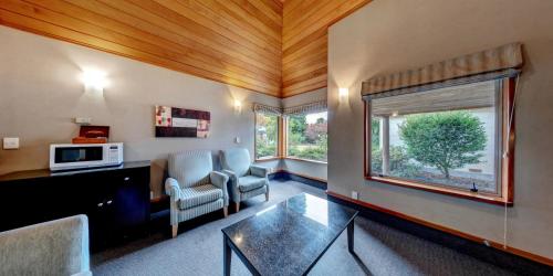 Area soggiorno di Distinction Te Anau Hotel & Villas
