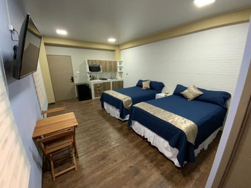 Katil atau katil-katil dalam bilik di Villa Las Flores