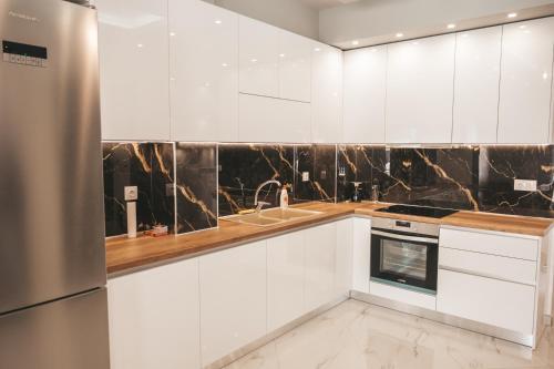 Zdjęcie z galerii obiektu Lovely apartment with balcony in the city center w mieście Kateríni