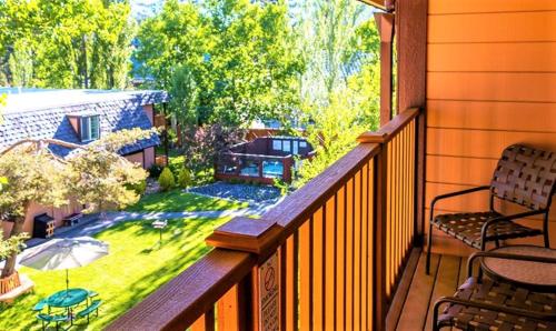 a balcony with a view of a yard at The Tahoe Beach & Ski Club Owners Association in South Lake Tahoe