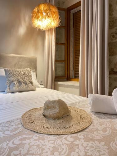 Кровать или кровати в номере Bohemian Boutique Suites