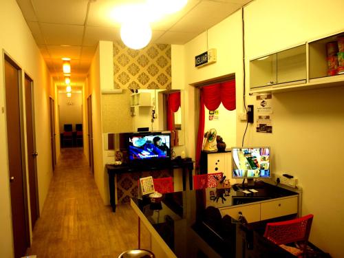 טלויזיה ו/או מרכז בידור ב-Fang Zu Ming Concept Guesthouse