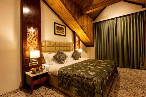 מיטה או מיטות בחדר ב-Apple Orchard Resort & Spa