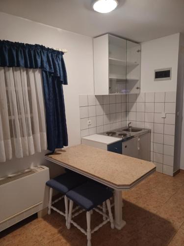 Kuchyň nebo kuchyňský kout v ubytování Hotel Ivan Dujmović Dvori