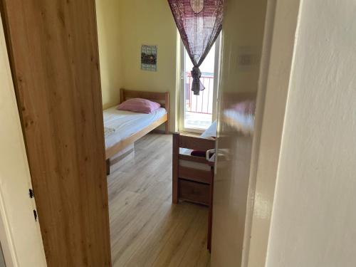 Ένα ή περισσότερα κρεβάτια σε δωμάτιο στο Apartment Bogdanovic 2