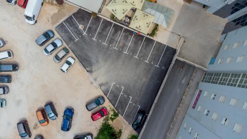 an overhead view of a parking lot with cars parked at Priska Med Luxury Rooms in Split