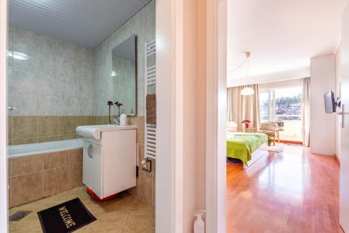 Koupelna v ubytování Dimar Apartments