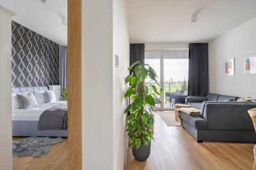 Χώρος καθιστικού στο Symphony Modern Tower Apartamenty
