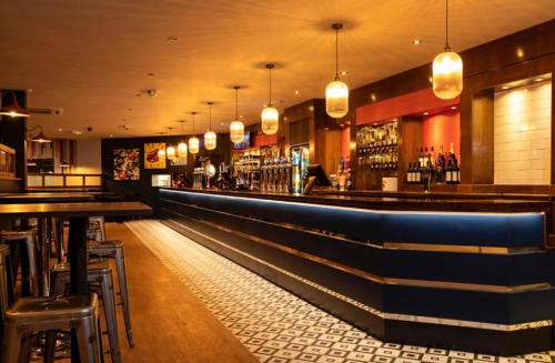 a bar with a row of bar stools at Great Yarmouth PK Sunset View - NOW with Linen in Great Yarmouth
