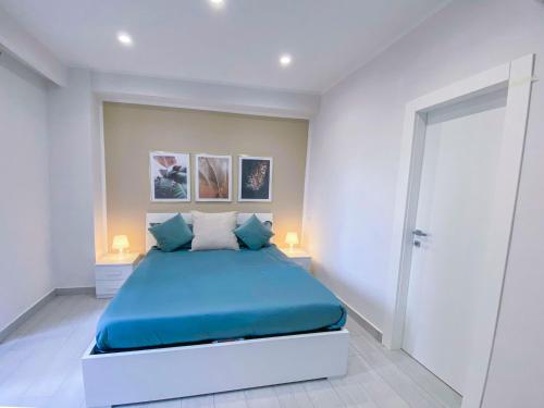 Ένα ή περισσότερα κρεβάτια σε δωμάτιο στο B&B VMHome