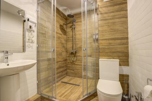 Ванная комната в Olimp Hotel