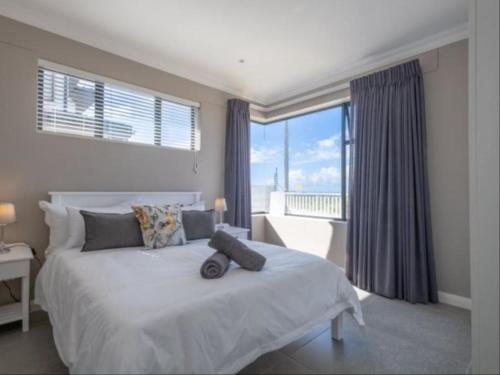 Giường trong phòng chung tại Ocean Pearl Accommodation