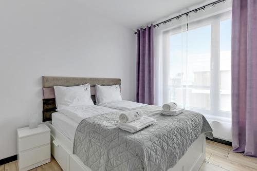 Posteľ alebo postele v izbe v ubytovaní Lion Apartments - Botanica