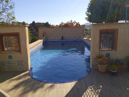 Bazén v ubytování B & B Finca sencilla nebo v jeho okolí